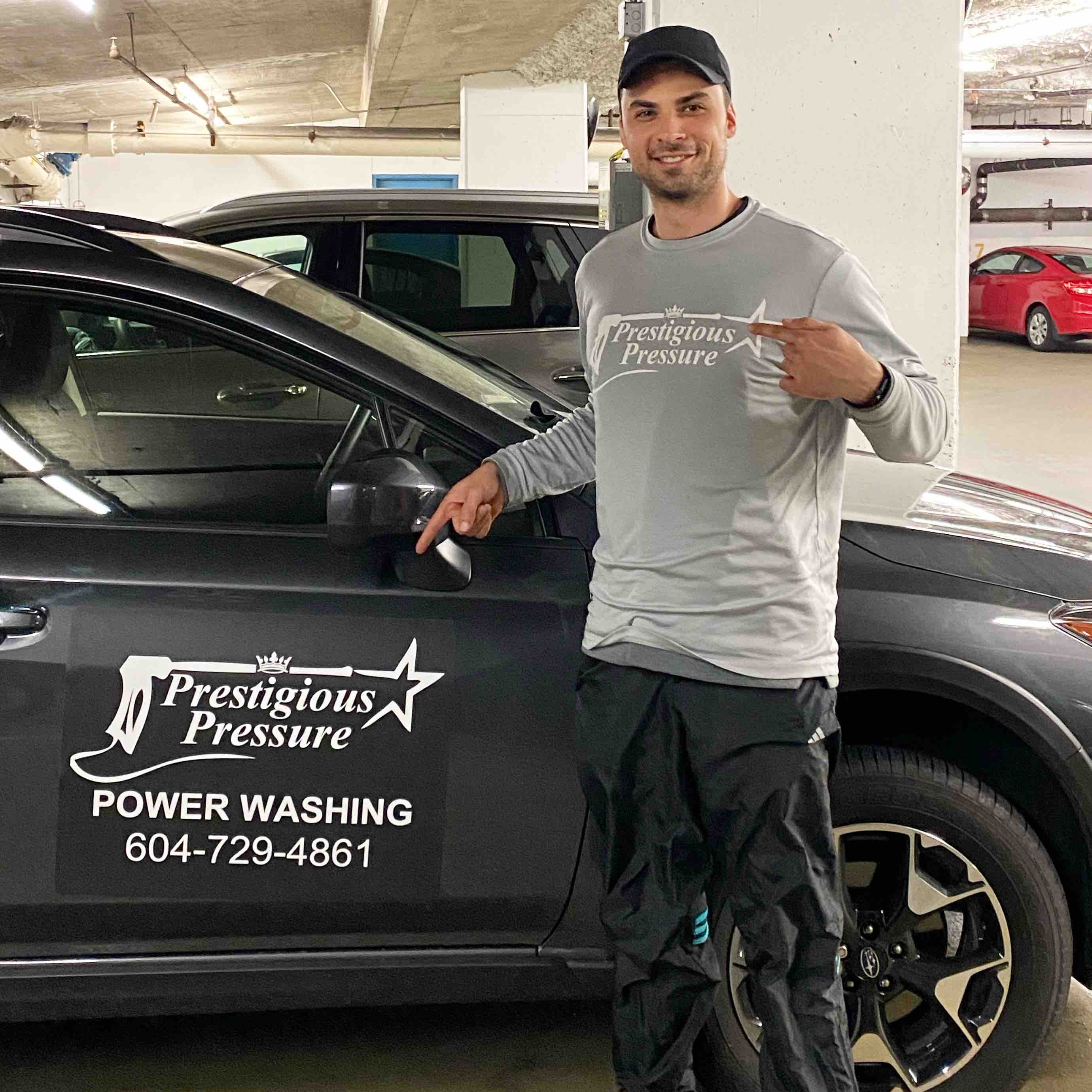 smiling employee with Prestigious Pressure vehicle